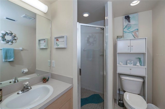 full bath with toilet, a shower stall, visible vents, and vanity