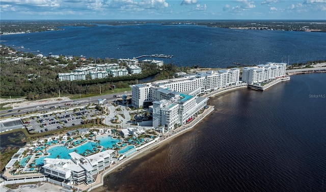 drone / aerial view with a water view and a city view