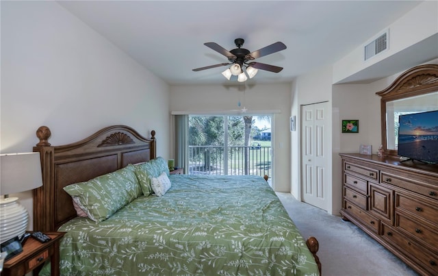 carpeted bedroom featuring ceiling fan, access to outside, and visible vents