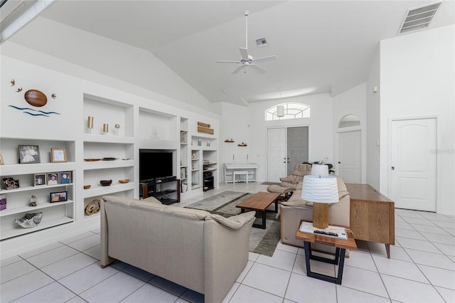 tiled living room featuring french doors, high vaulted ceiling, ceiling fan, and built in shelves