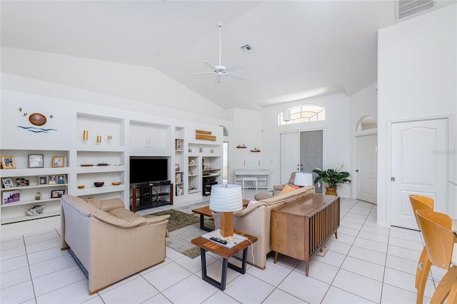 tiled living room featuring built in features, high vaulted ceiling, and ceiling fan