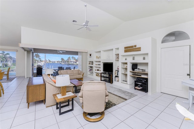 tiled living room with built in shelves, ceiling fan, and lofted ceiling