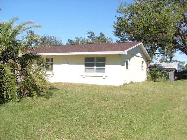 exterior space with a lawn