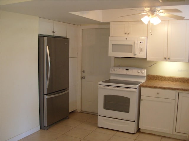 kitchen featuring ceiling fan, white cabinetry, and white appliances