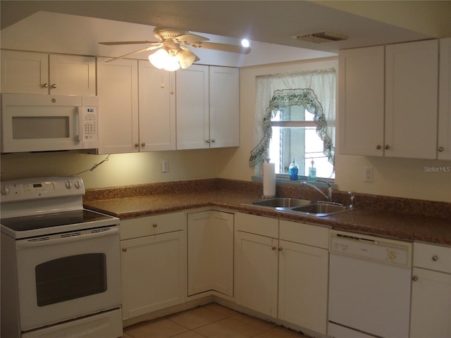 kitchen featuring ceiling fan, sink, light tile patterned floors, white appliances, and white cabinets