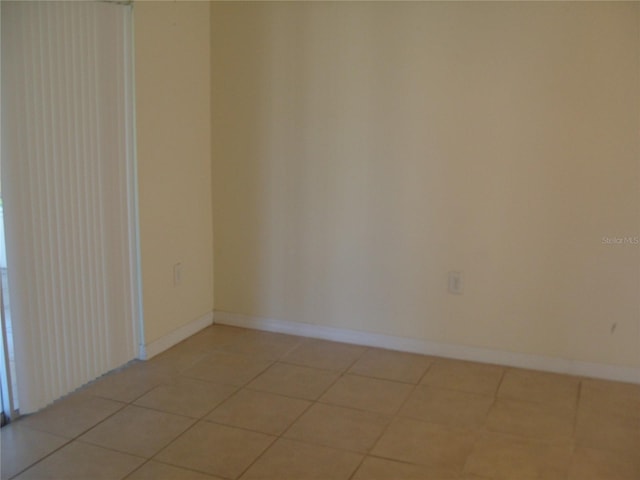 view of tiled spare room