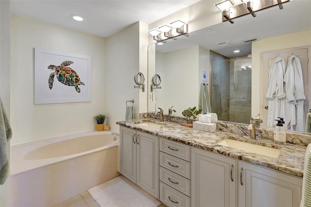 bathroom with vanity, tile patterned floors, and independent shower and bath