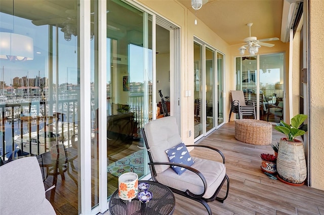 balcony featuring ceiling fan