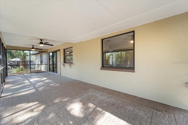 view of patio featuring ceiling fan