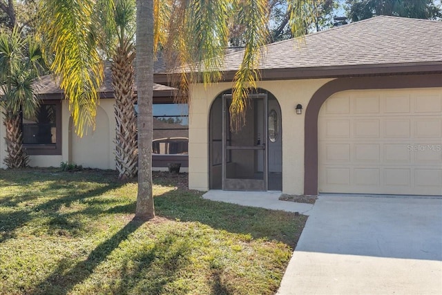 21047 Baffin Ave, Port Charlotte, FL 33954 - doorway to property featuring stucco siding, a garage, a yard, roof with shingles, and concrete driveway
