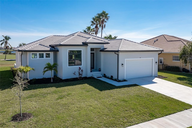 single story home with a front yard and a garage