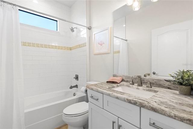 full bathroom with vanity, toilet, and shower / bath combo with shower curtain