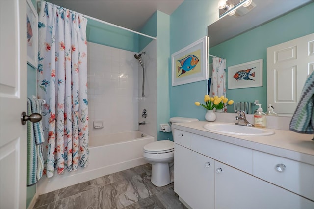 full bathroom with vanity, shower / bath combo, and toilet