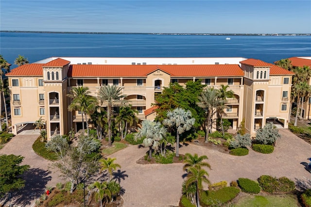 birds eye view of property featuring a water view