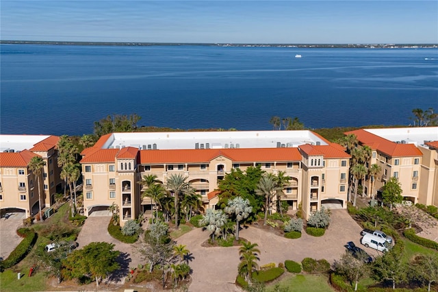 drone / aerial view featuring a water view