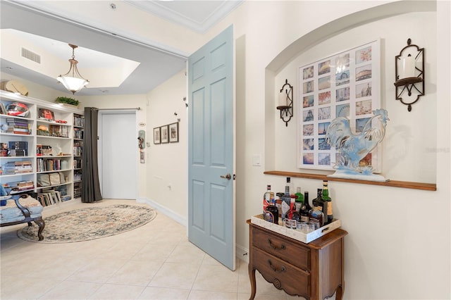 interior space featuring crown molding