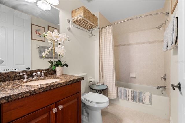 full bathroom with toilet, vanity, tile patterned floors, and shower / tub combo with curtain