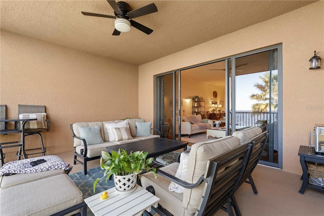 view of patio with an outdoor hangout area and ceiling fan