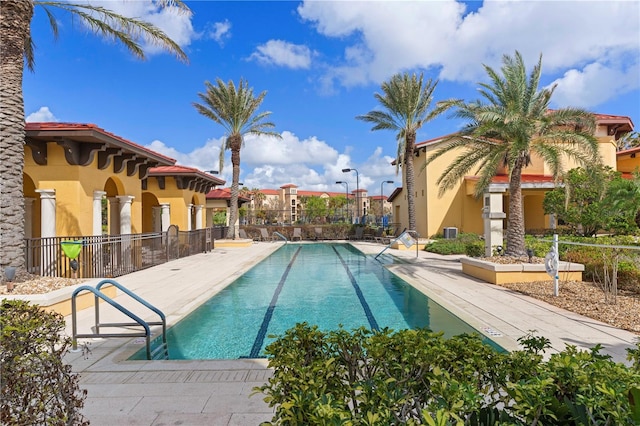 view of swimming pool featuring a patio area