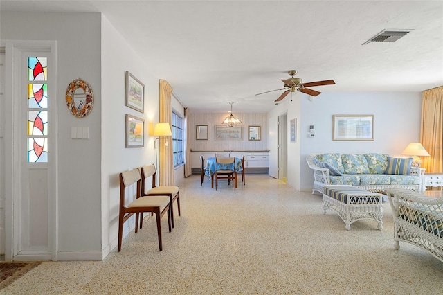 living room featuring ceiling fan