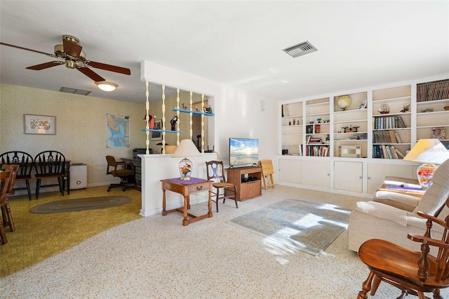 living room with ceiling fan