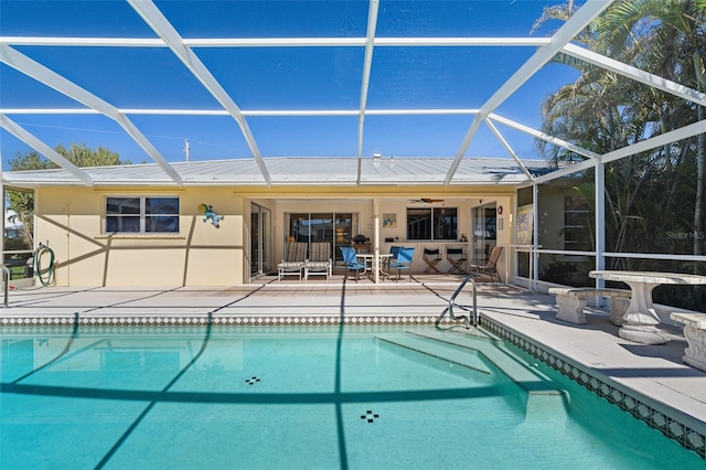 view of pool featuring a lanai and a patio