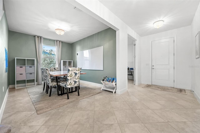 view of tiled dining room