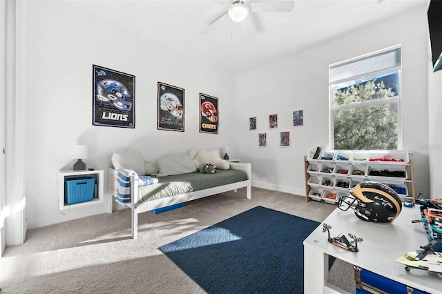 carpeted living room featuring ceiling fan