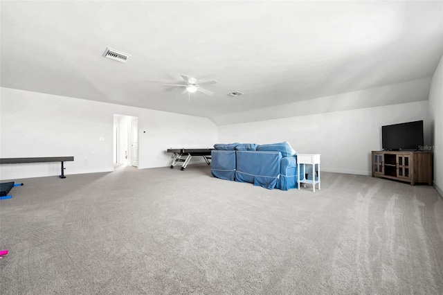 bonus room featuring ceiling fan and light colored carpet