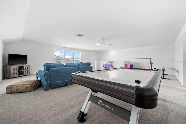 playroom with ceiling fan, light carpet, and lofted ceiling