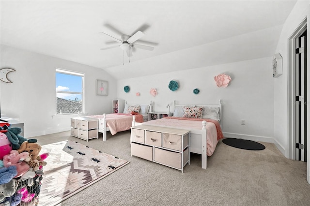 carpeted bedroom featuring ceiling fan and lofted ceiling