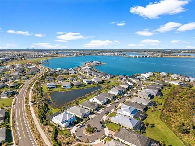 bird's eye view with a water view