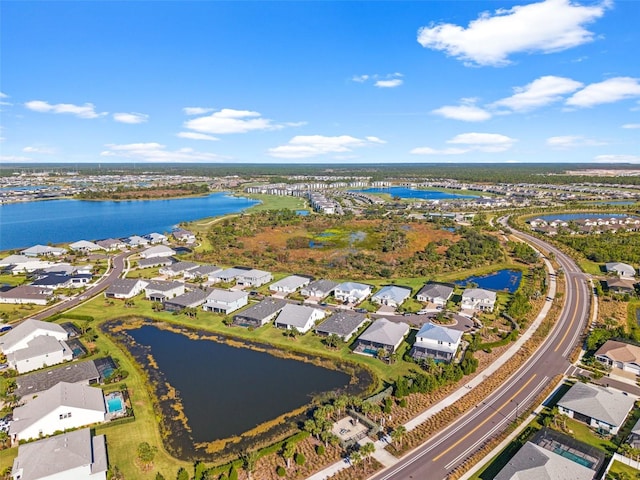 drone / aerial view featuring a water view