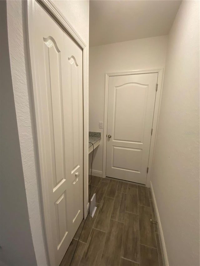 hall featuring dark hardwood / wood-style floors