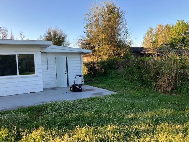 view of yard with a patio area