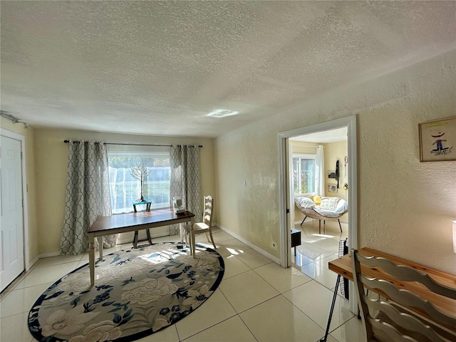 interior space featuring a textured ceiling