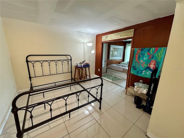 bedroom featuring tile patterned floors