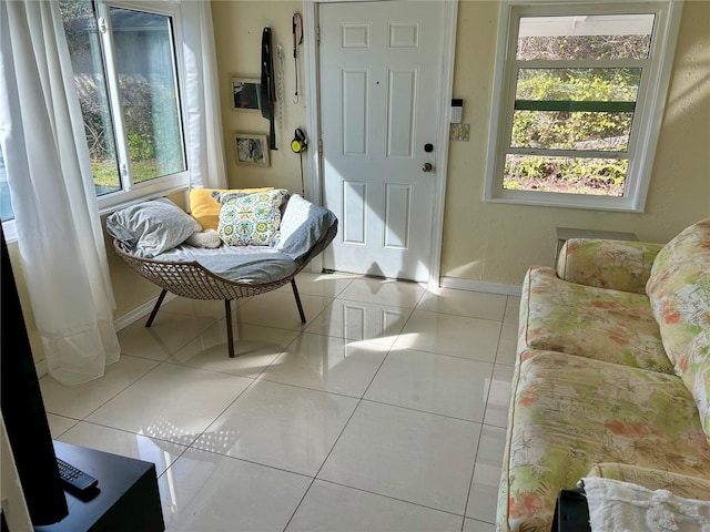 living area with light tile patterned floors