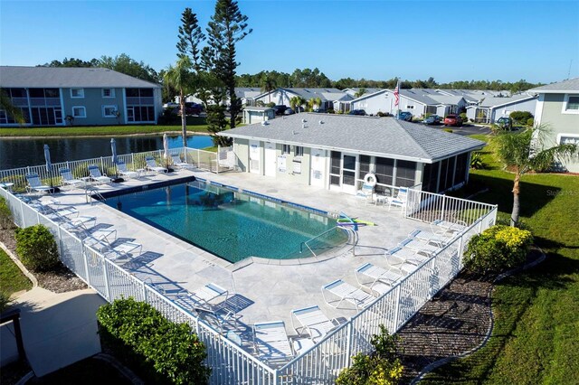 3310 Loveland Blvd Unit 2304, Punta Gorda, FL 33980 - community pool with a residential view, a patio, a sunroom, and a water view