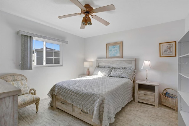 bedroom featuring ceiling fan and light hardwood / wood-style floors