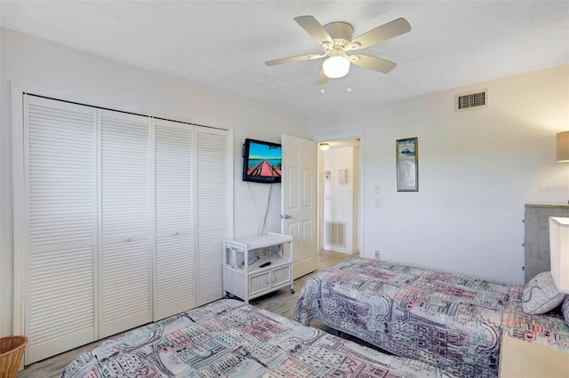 bedroom with a closet and ceiling fan