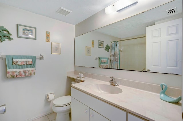 bathroom featuring a shower with curtain, tile patterned flooring, vanity, and toilet