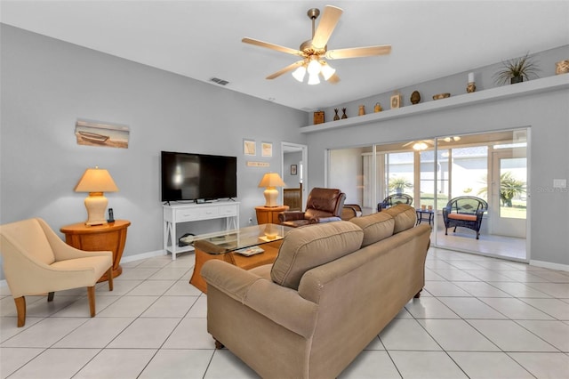 tiled living room featuring ceiling fan