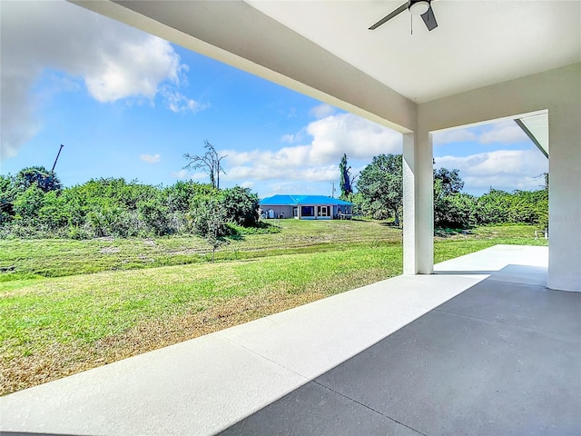 view of patio / terrace featuring ceiling fan