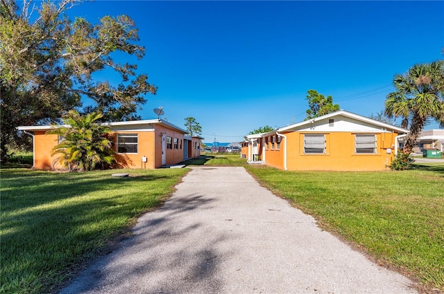 view of property exterior featuring a yard