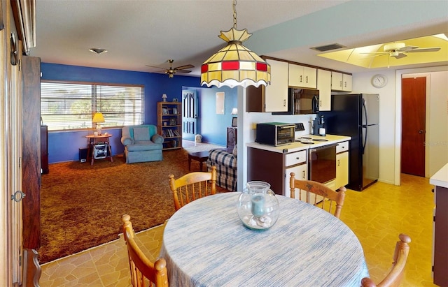 dining area with ceiling fan