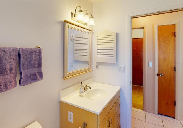 bathroom featuring tile patterned floors and vanity