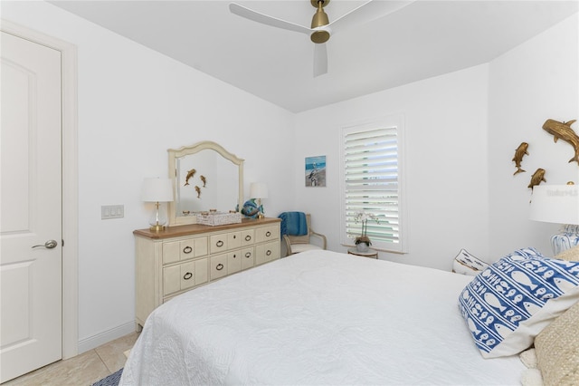 bedroom with light tile patterned flooring and ceiling fan