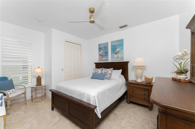 bedroom featuring a closet and ceiling fan