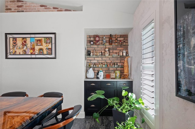 office space with vaulted ceiling